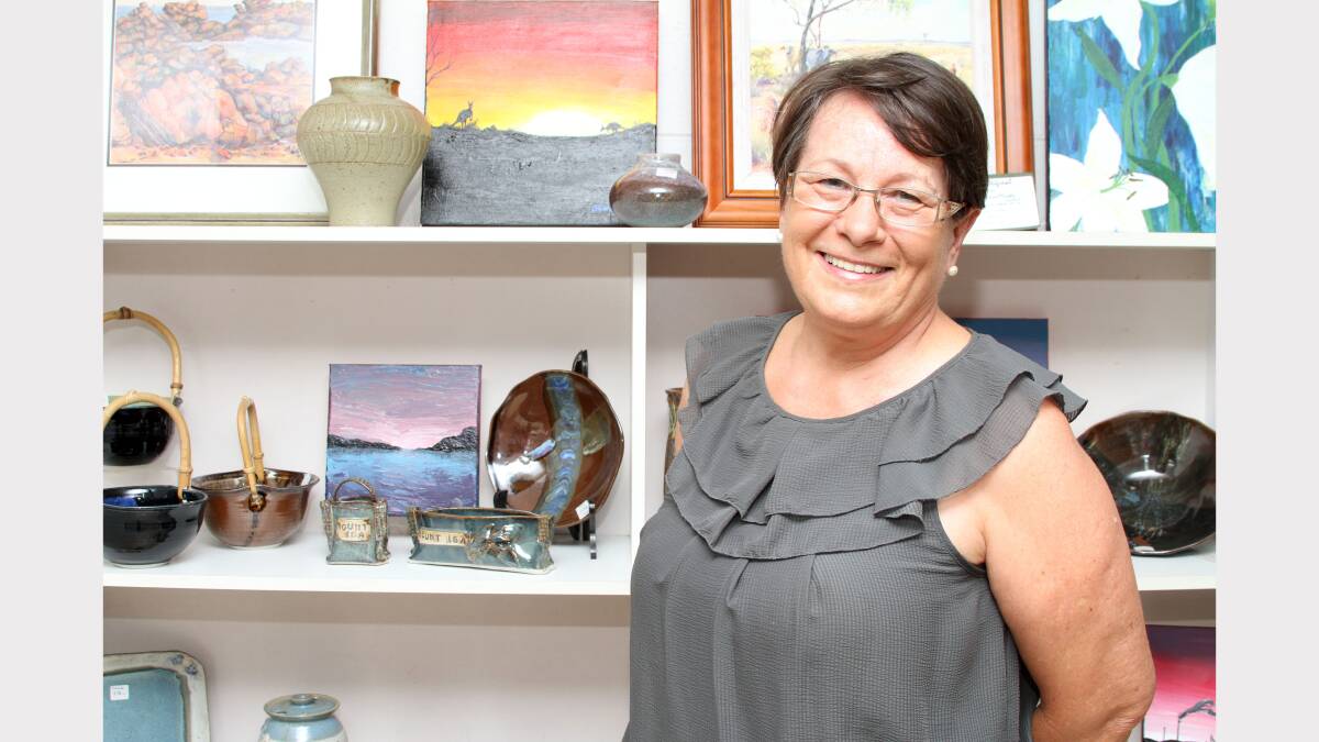 BUY LOCAL: Mount Isa Potter's Group Inc gallery director Michele Savoye said residents who wanted to source local Christmas gifts this year could buy works from home-grown artists at this Saturday's Christmas Sale. Picture: Kate Glover.
