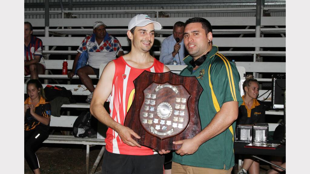 Gian Guerra of Redskins accepts the A-grade Mixed title from Eli Sweeney.  Picture: KATE GLOVER
