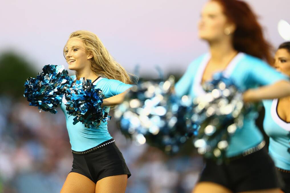 The Mermaids cheergirls perform during half time. Photo by Mark Kolbe/Getty Images