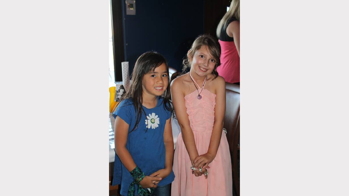 GORGEOUS GIRLS: Looking stylish are Joan McComb, 6, left with Carly Lobegeiger, 9.