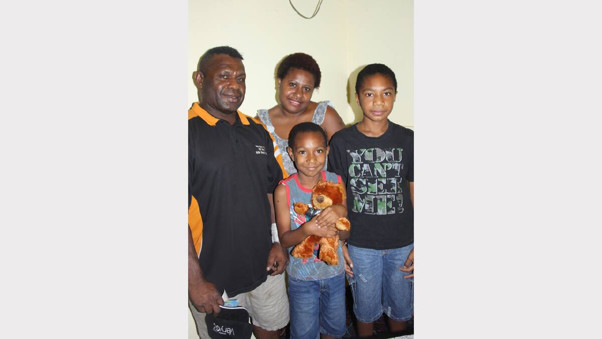 FAMILY TIME: From left, Martin, Elly, Reynold, 7 and Scott Baimu, 12.