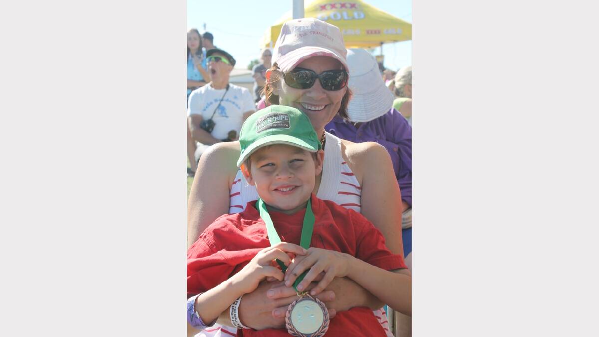 JULIA CREEK REP: Redclaw Luncheon coordinator Sheree Pratt with her son Sam, 6, who came third overall in his age group.