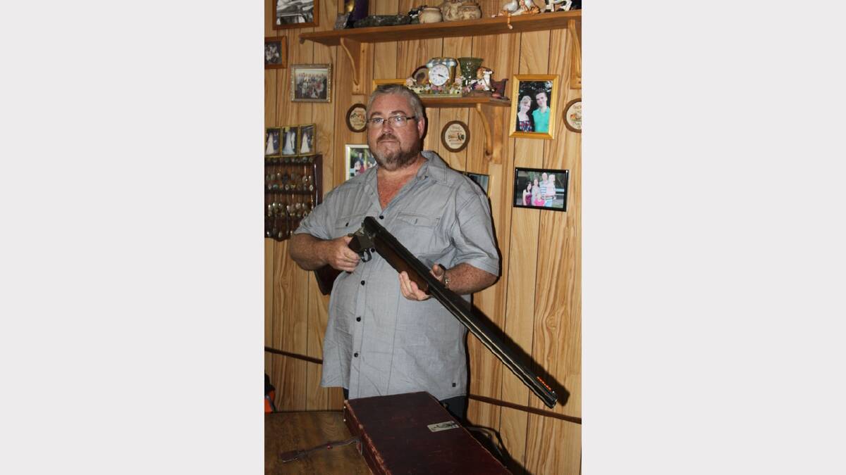 SPORT SHOOTER: Mount Isa Gun Club President Mick Coleman with his Grand European Winchester shotgun.