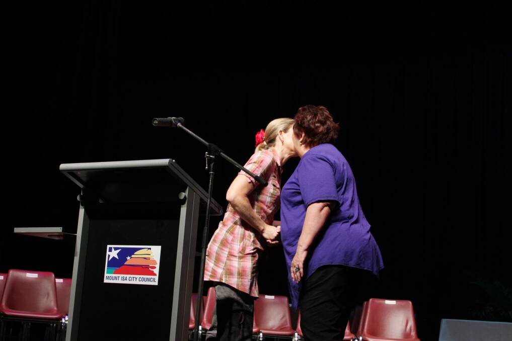 CONGRATULATIONS: Joyce McCullouch presents the award for Community Event of the year to Jean Ferris for the Carols by Candlelight event.  