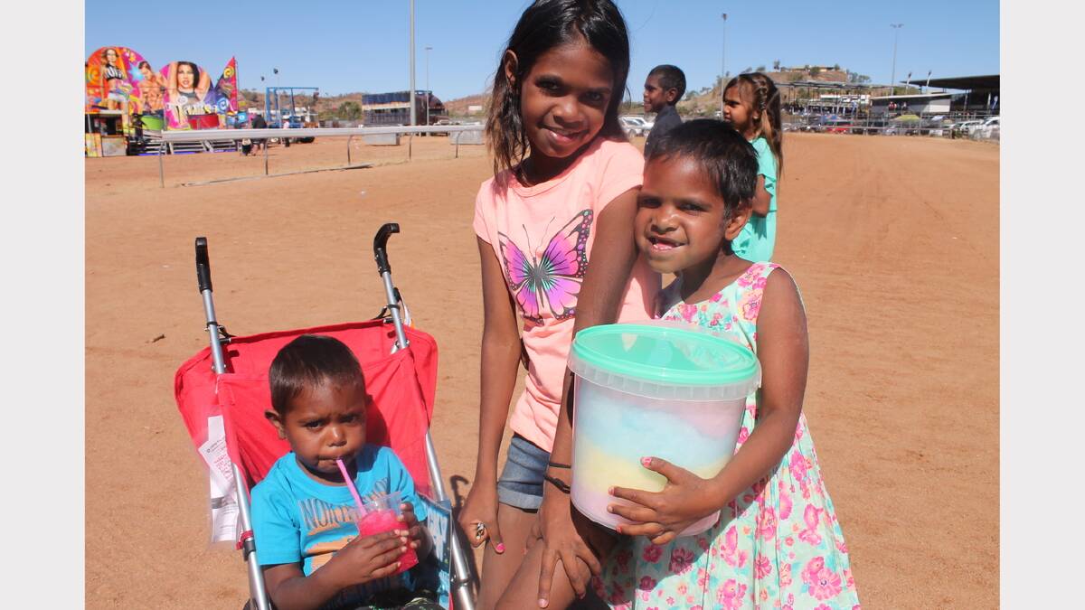 SUGAR HIGH: Kaiden, 2, Dalida, 8, and Shakira, 5, Spratt went home with a year's supply of fairy floss.