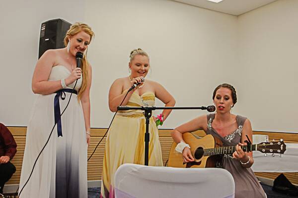 SING-A-LONG: Melissa Couchman, Samantha Parkes and Victoria Hardingham sing one last song for the graduates of 2013 - Time Of Your Life by Greenday.