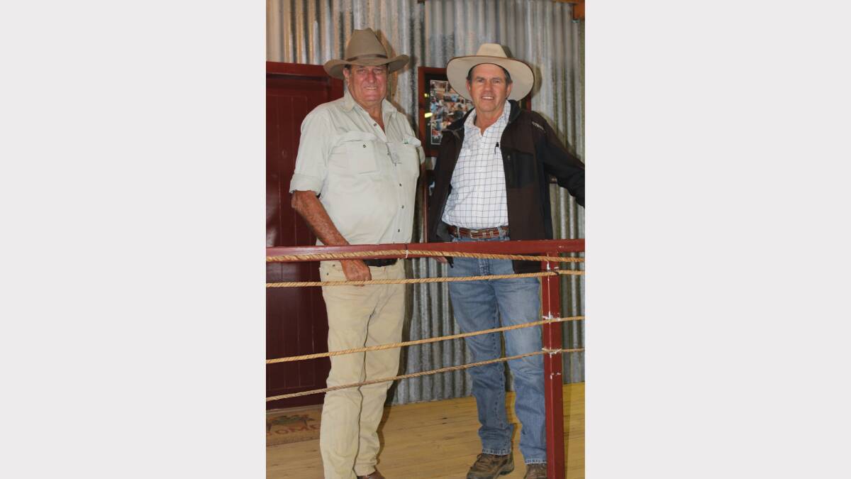 CATCH UP: Peter Leacy (Hughenden) and John Meek (Rockhampton) reminisce on their old droving days while looking at the Drover's Camp displays.