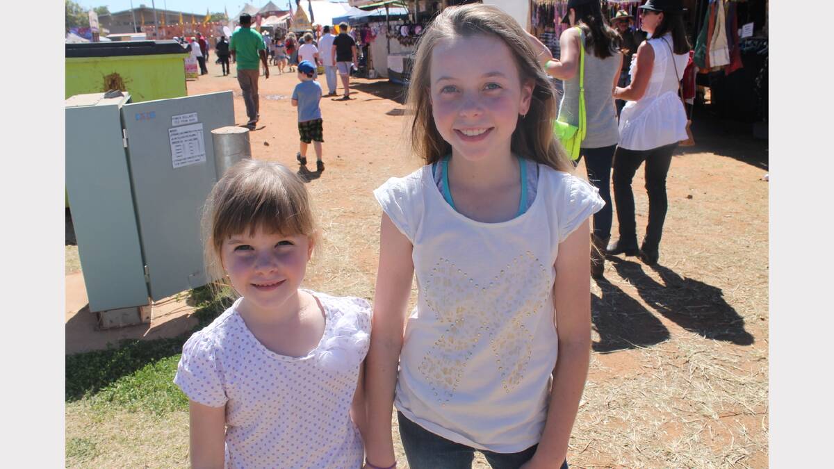 SISTERS: Ruby, 5, and Emma, 10, Robins got to go to their very first rodeo on Saturday.