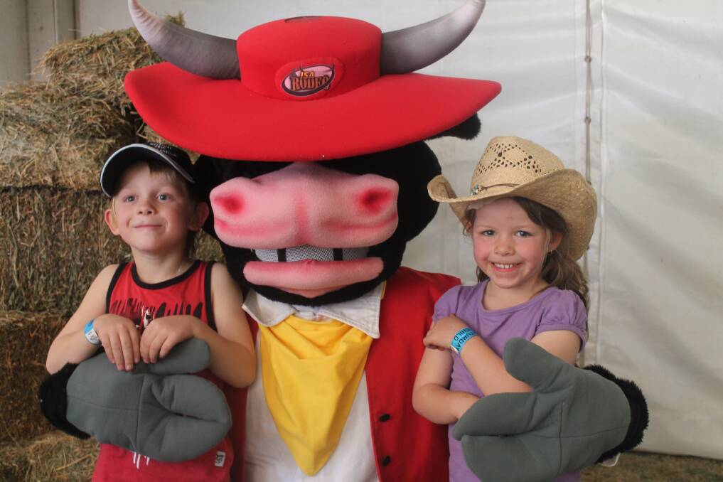 COWBOY CORNER: Kovi and Lacey Phillips, both 5, met Chainsaw the bull.