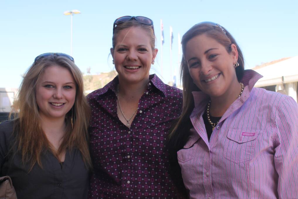 LOVELY LADIES: Jessica Solomon, Cassie Lloyd and Katieanne Lacke pulled out their best rodeo attire for the weekend.