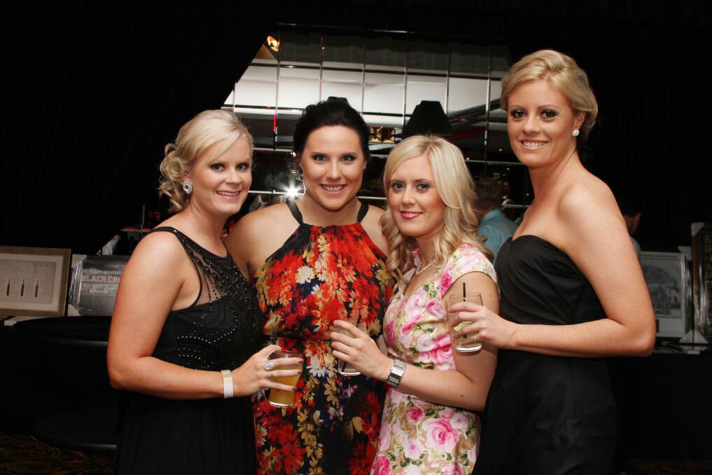 CHEERS: Sharny O’Brien, Kate Plant, Natalie Norris and Mel Duncan. 