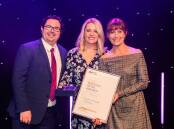 2022 winner Melissa Wilkinson (centre) with business partner Matthew Mosse-Robinson and National Retail Association board member Alice Barbery. Picture supplied.