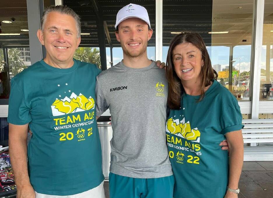 Skier James Matheson (centre) with his parents after arriving at Sydney Airport on Wednesday, February 10. Photo: Australian Olympic Team.