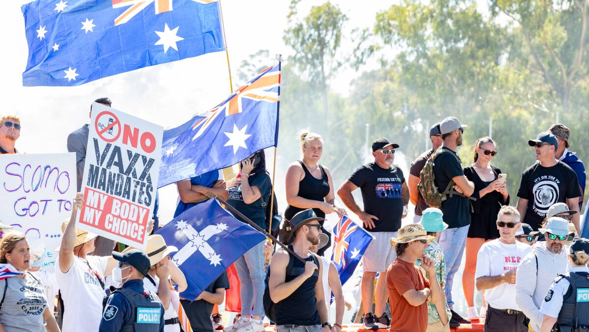 Thousands of people marched to Parliament House on Saturday as part of the Convoy to Canberra protest. Picture: Sitthixay Ditthavong