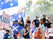 Thousands of people marched to Parliament House on Saturday as part of the Convoy to Canberra protest. Picture: Sitthixay Ditthavong