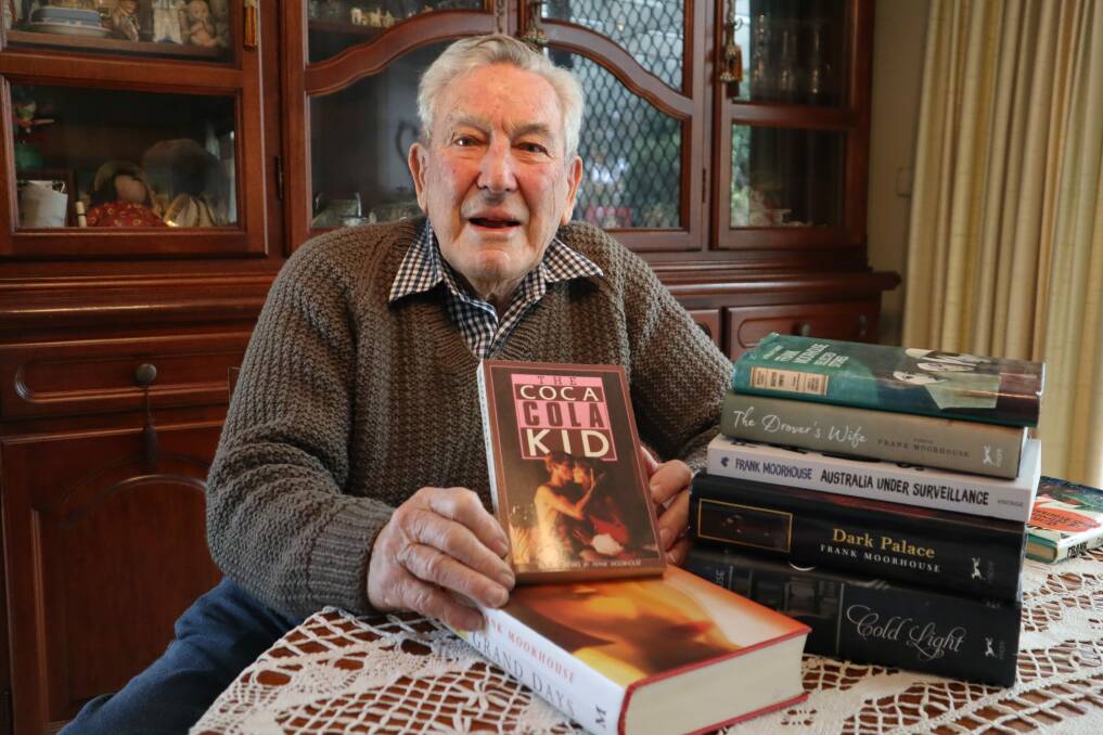 Arthur Moorhouse keeps a collection of his brother's novels; he favours 'The Coca Cola Kid'. Picture: Jorja McDonnell