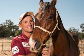 Fab's Cowboy with his Barcaldine based trainer Bevan 'Billy' Johnson. Picture by Racing Queensland.