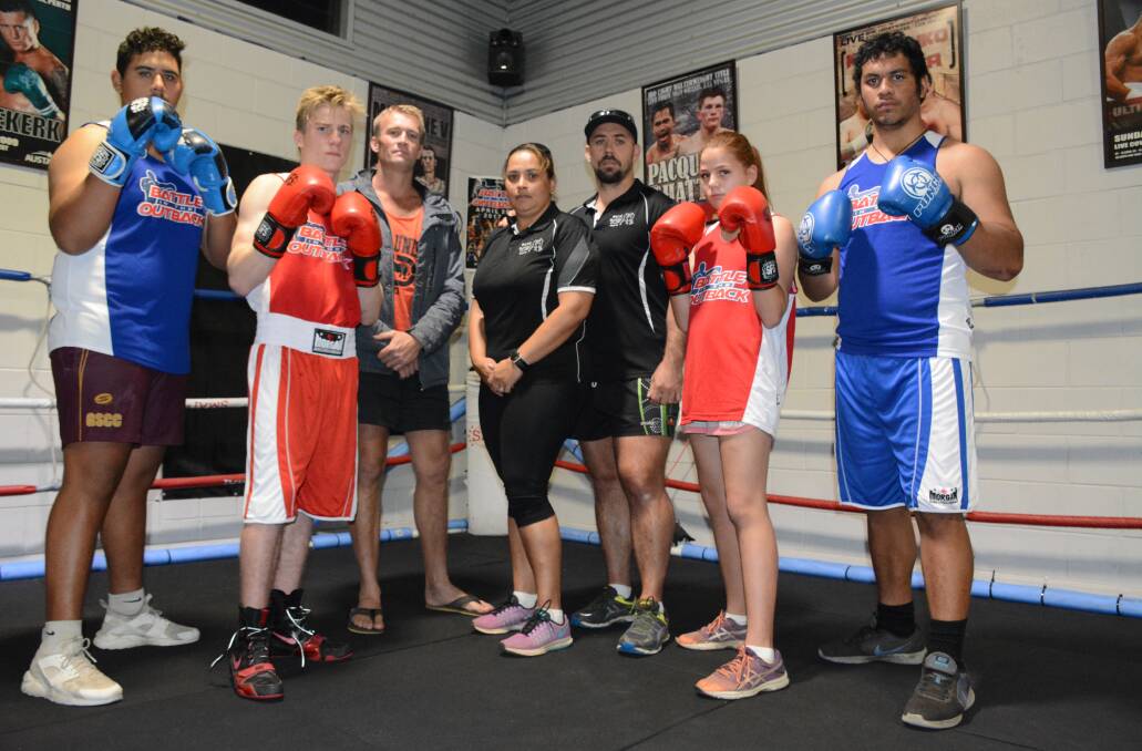 PCYC fighter Bailey Derrick, fighter Joshua Arsenic, Battle of the Outback organiser Scott Crawford, PCYC boxing coaches Kerry and James Derrick, fighter Ebonee Hearne and fighter Heemi Tuwairua prepare for the next local Battle of the Outback. Photo: Chris Burns. 
