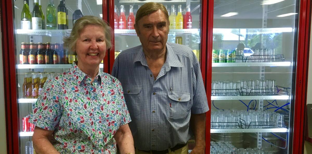 BACK IN BUSINESS: Julia and Peter Hayden in the reopened bar. Photo: McKinlay Shire Council. 