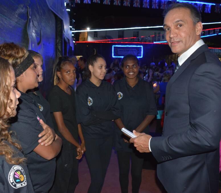 NETWORKING: Glencore's North Queensland Copper Assets chief operating officer Mike Westerman meets the Project Booyah youth serving at the Casa Grande Ball. Photo: Chris Burns. 