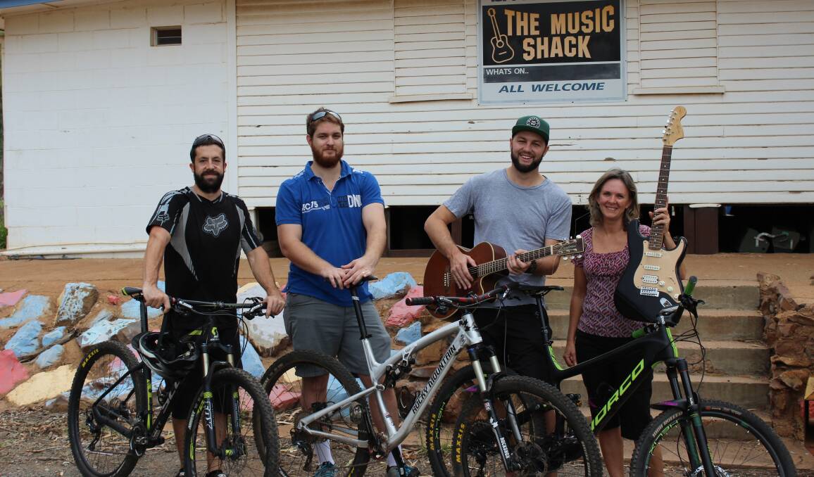 ON TOUR: MTB competitors Graham Peden, Corey Shelley and Reece Cooper with The Music Shack's Wendy Campbell. Photo: Samantha Walton. 