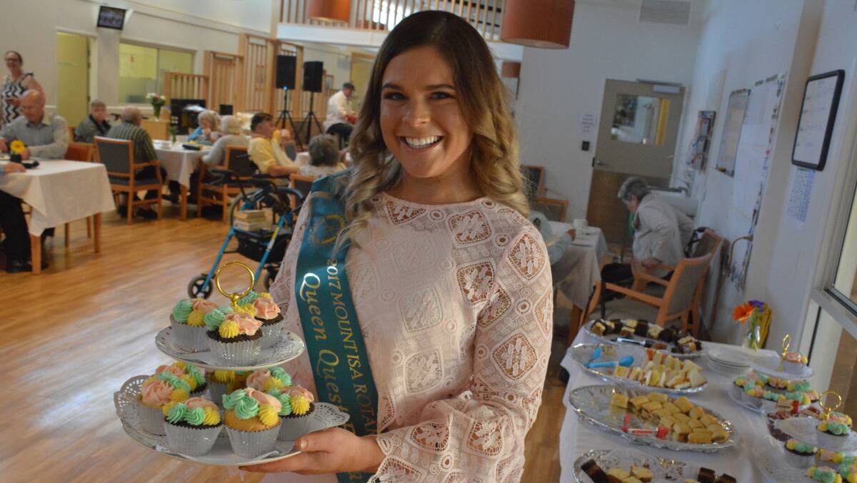 Mount Isa Rotary Rodeo Queen Quest contestant Moz Miller hosts a morning tea for Laura Johnson Home residents. Photo: Chris Burns. 