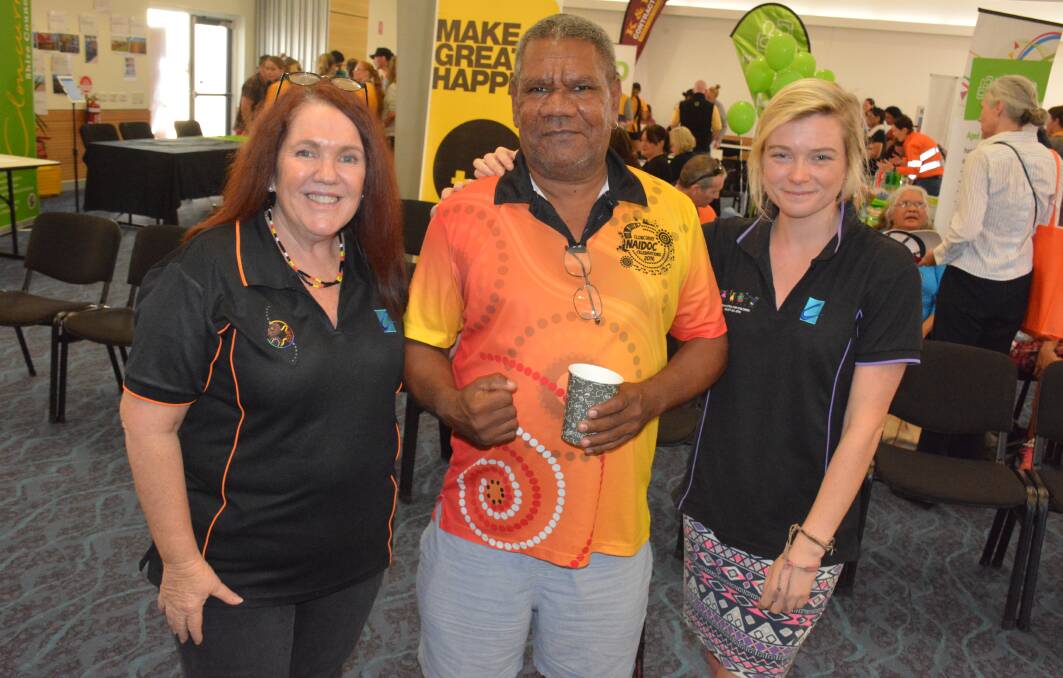 Centacare's Leeanne Harris, with Naidoc committee president Ronald 'Hombre' Major, and Centacare's Jo Moore. 