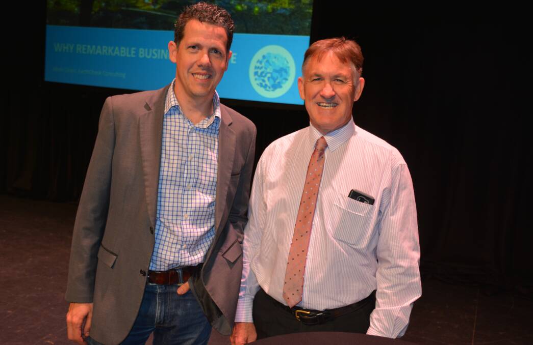 EarthCheck general manager Mark Olsen and Mount Isa deputy mayor Phil Barwick at the business boost workshop held at the civic centre. Photo: Chris Burns. 