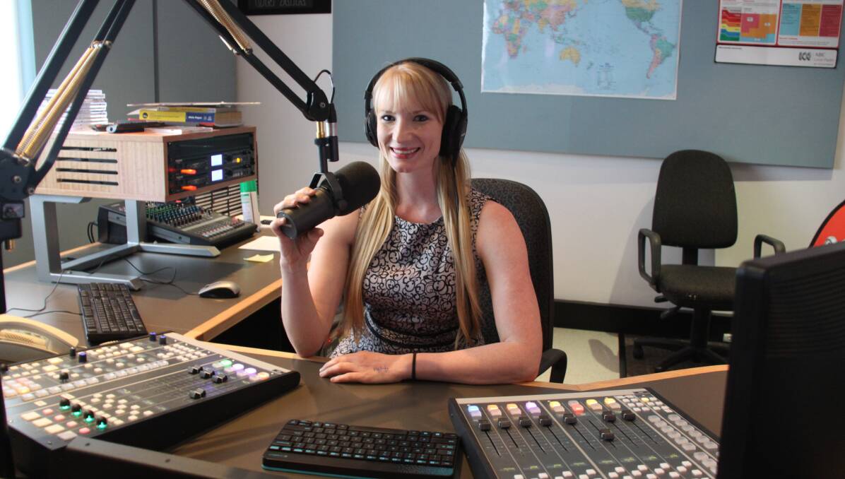 BEHIND THE SCENES: Breakfast presenter Emma Cillekens in the studio during her last show. Photo: ABC North West Queensland. 
