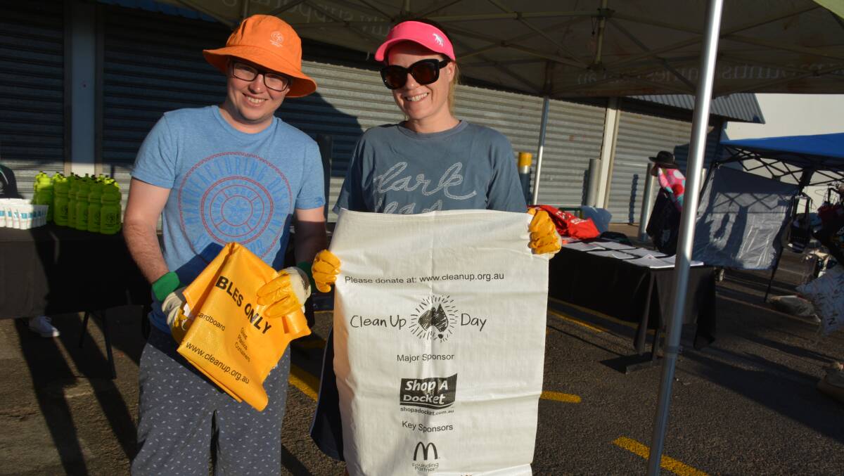 The first Northern Cleanup volunteers to sign up in Pioneer on Sunday morning are Mitch Green and Gina Walker. Photo: Chris Burns. 