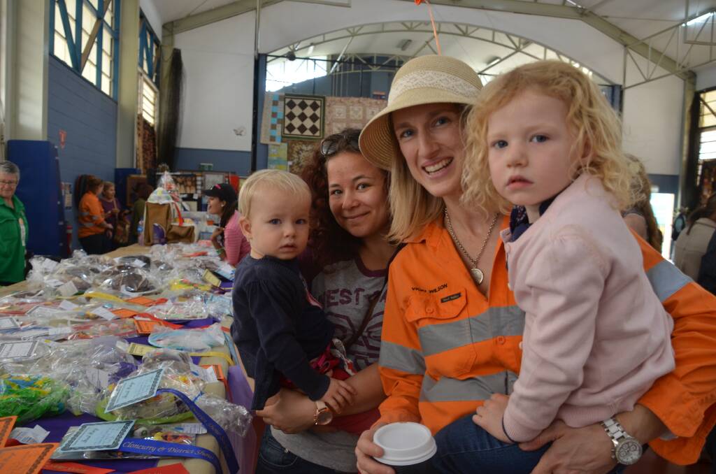 BEST IN PRODUCE: Checking out the pavilion entries at last year's Cloncurry Show are Mathilda McClymont, Anni Kulpe, Vicki Wilson and Poppy McClymont.