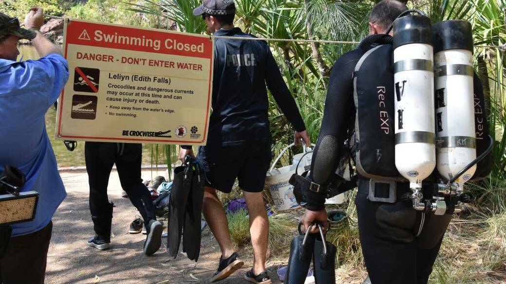 The Edith Falls plunge pool was opened to the public again yesterday as police divers turn their attention to other water holes in the area.