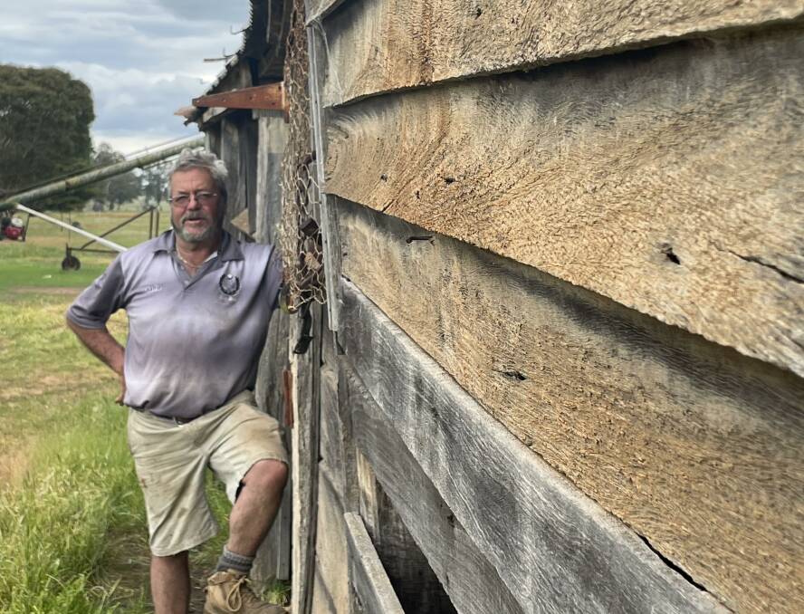 Charlie Officer, Toolondo with the slab hut originally used as shearers' quarters at neighbouring Mt Talbot Station before becoming the stables at his property Changbool.