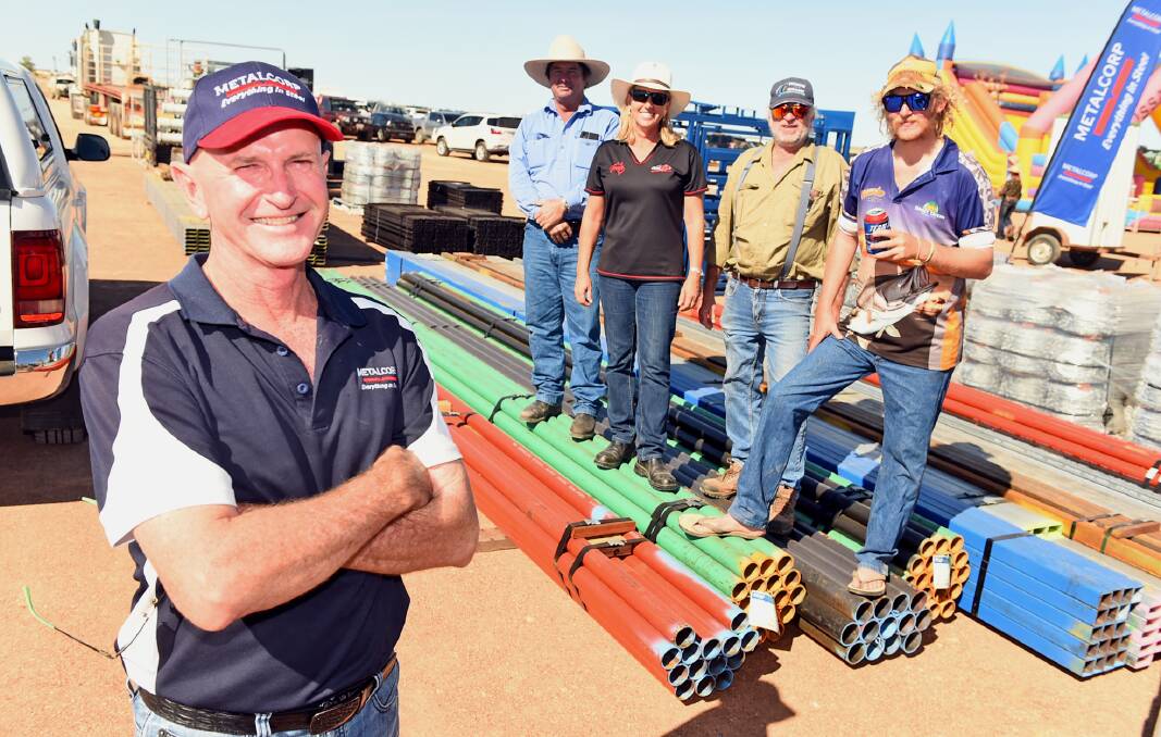 Adrian Peno of Metalcorp Steel, Charters Towers and Austral Wire Products consultant Kim Lang, with some customers.