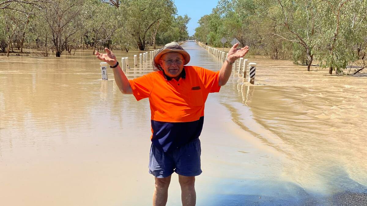 Strategic road funding is one area where western shires have a common purpose and Bulloo Shire mayor John 'Tractor' Ferguson, pictured at the flooded Warri Gate Road, will be hoping the united approach will benefit the economy in Queensland's far south west.