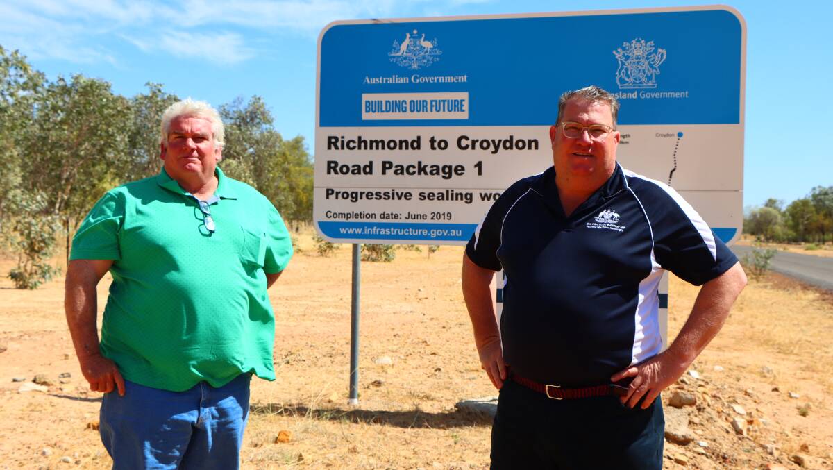 Croydon Shire Council mayor Trevor Pickering and assistant minister Scott Buchholz inspect the last road sealing work that took place between Croydon and Richmond. Photos supplied.