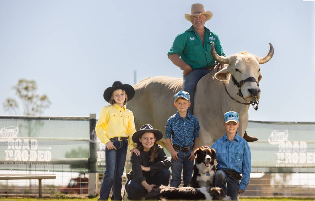 Audrey, Maggie, George and Louis Bull with Longreach local John Hawkes, his bullock Ollie and dogs Henry and Arthur. Picture supplied.