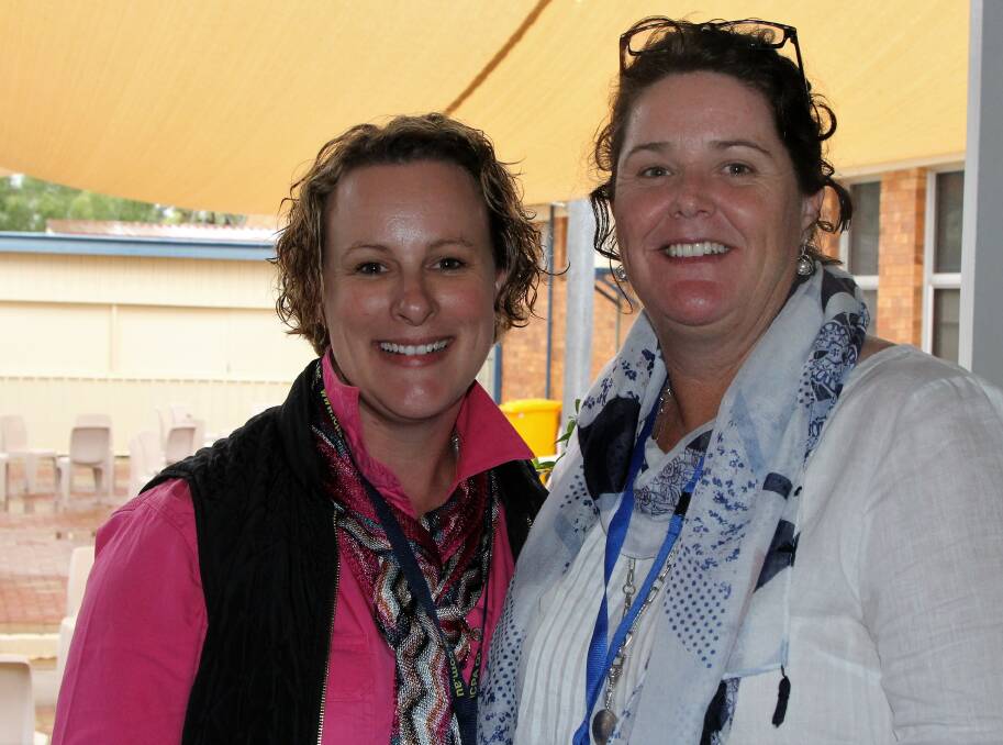 Moonie's Tracey Burke and Melinda White were working hard as delegates at the conference. Pictures - Sally Cripps.