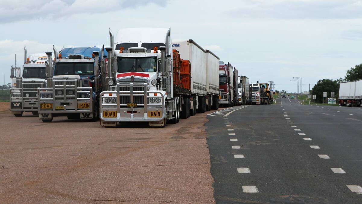 Enforced rest: Roadtrains at Longreach and elsewhere have been parked up waiting for floodwaters in Queensland's north west to recede. Pictures: Sally Cripps.