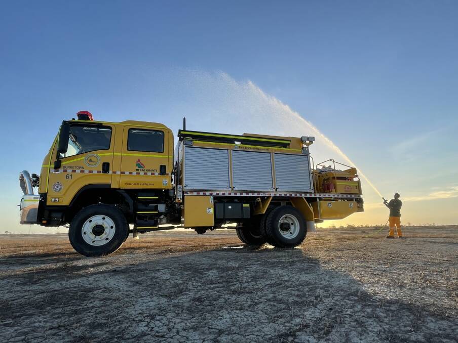 Burketown's new $500,000 fire truck was christened with water upon delivery at the start of December.