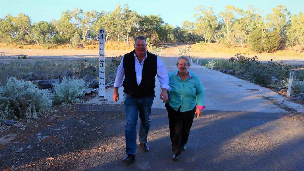 Scott Buchholz and Flinders Shire mayor Jane McNamara inspect the Glentor Floodway crossing improvement.