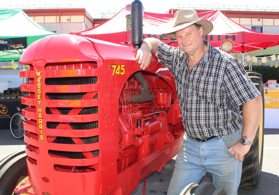 WHEELS OF TIME: This model may be nine years older than Darren Lutze, but such is the special bond between man and his tractor. Picture: ANDREA CROTHERS.