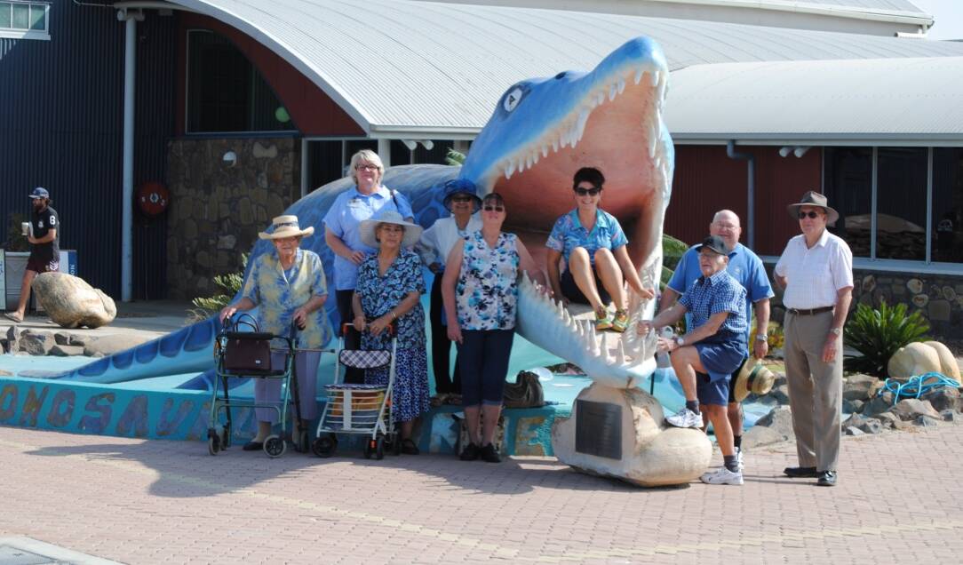 Blue Care staff, volunteers and clients at Kronoseaurus Corner, Richmond, a town famous for its fossils. Photo: supplied