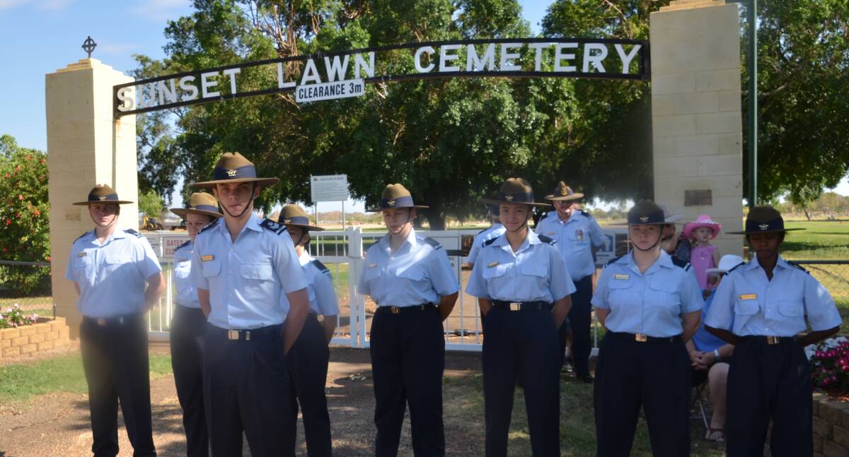 YOUNG AND OLD: Mount Isa Airforce cadets on parade at Mount Isa Sunset Lawn Cemetery, where three new signs mark the final resting place of 230 service personnel. Photos: Esther MacIntyre