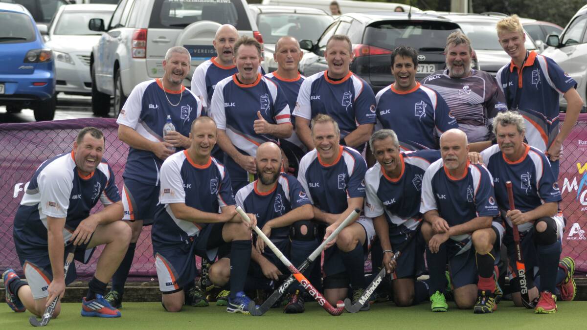 TATAS ON TOUR: Coach Ray Towler (left) with Isa Tatas hockey team, competing in the over 35s World Masters Games in Auckland in April. Photo: supplied