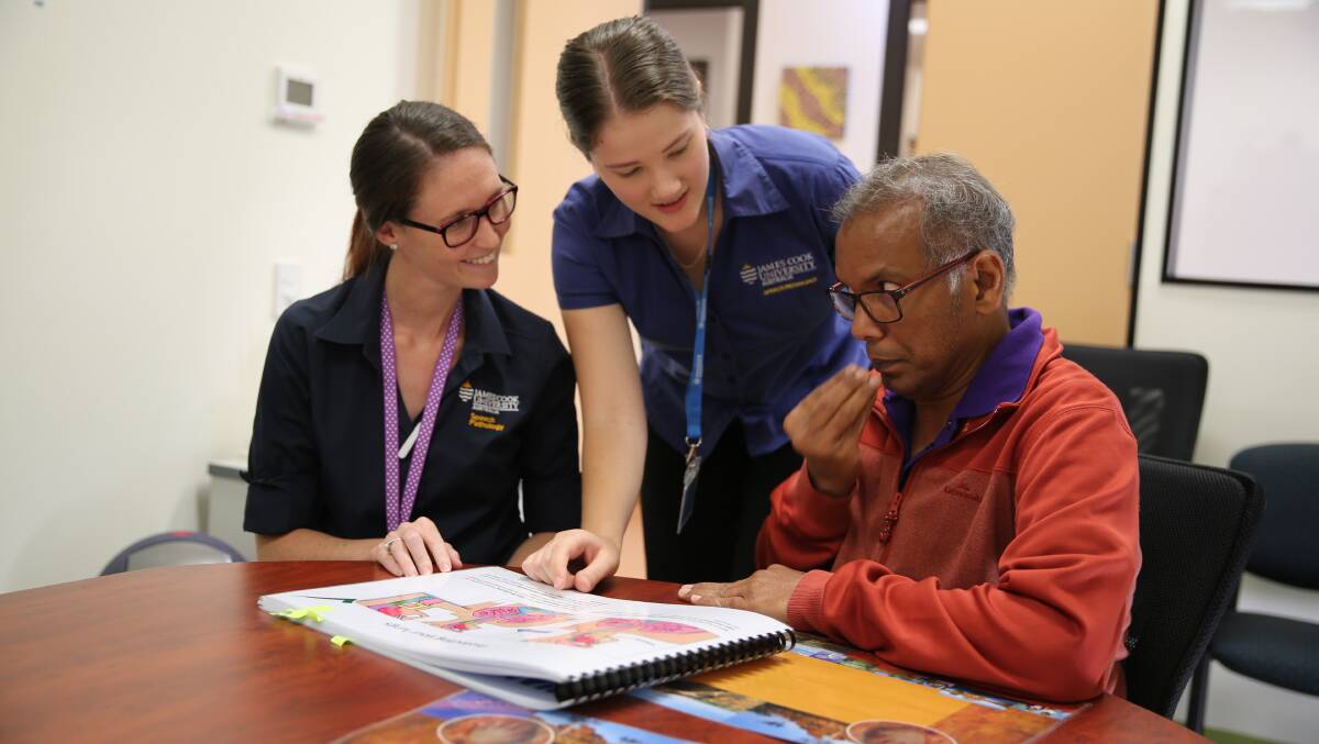 SPEAKING OF: MICCRH speech pathology students Jessica Steele and Rachel Adkins working with a client. Photo: supplied

