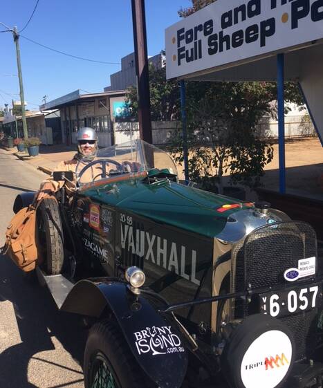 Andrew and his Vauxhall, trundling through the streets of Julia Creek. Photo: supplied