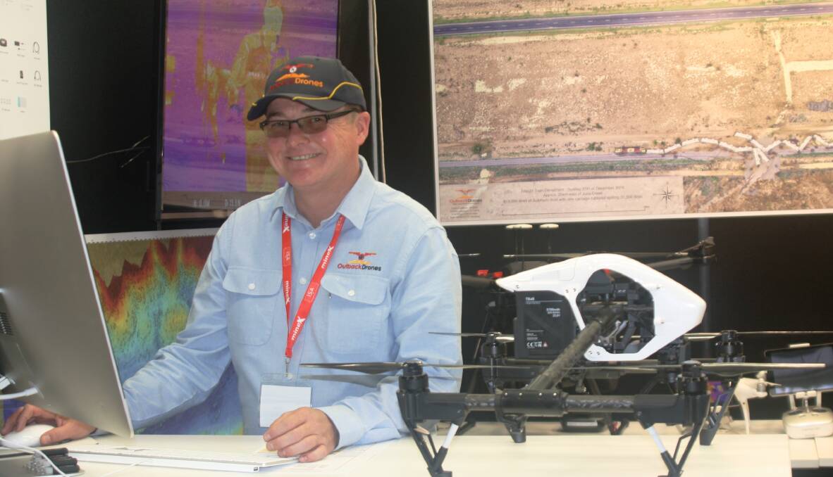 OUTBACK DRONES: Robert Mathieson enthuses on progress in drone technology, allowing new possibilities for aerial videography, mapping, and surveying in the mining industry. Photo: Esther MacIntyre
