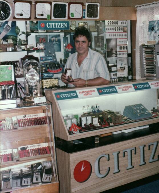 LIKE FATHER: Michaelangelo's father, Joe Grimaldi, an Italian watchmaker, in his first shop in Mount Isa on West Street, in the 1970s. Photo: supplied 