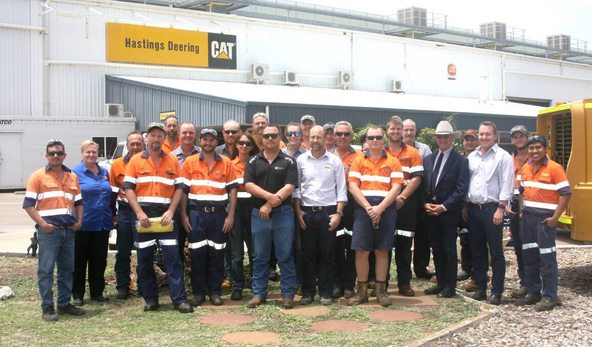 Some of the 55 strong team at Mount Isa's Hastings Deering, with Federal MP Bob Katter and Mount Isa Mines CEO Matt O'Neill, celebrating 40 years of business at 5 Kokoda Road. Photo: Esther MacIntyre